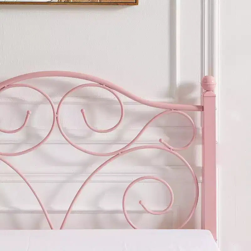 Struttura letto in metallo a volute con testiera e pediera
