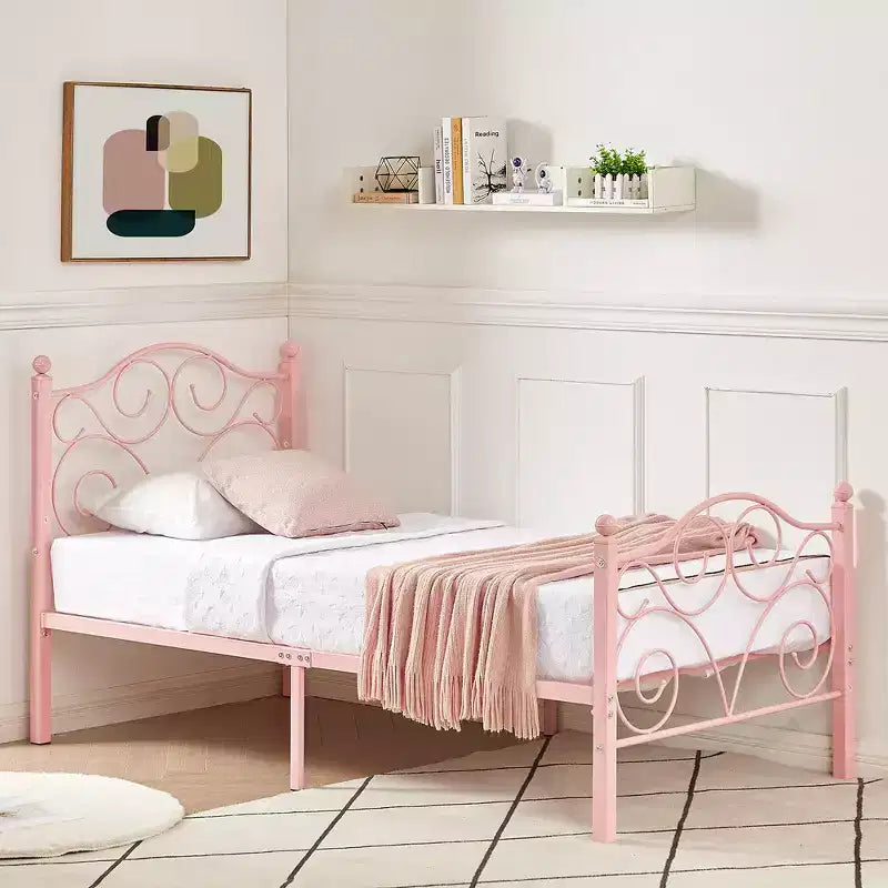 Struttura letto in metallo a volute con testiera e pediera