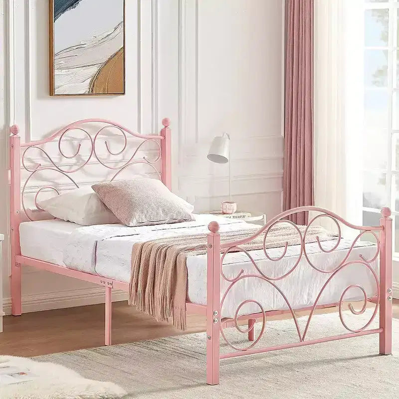 Struttura letto in metallo a volute con testiera e pediera
