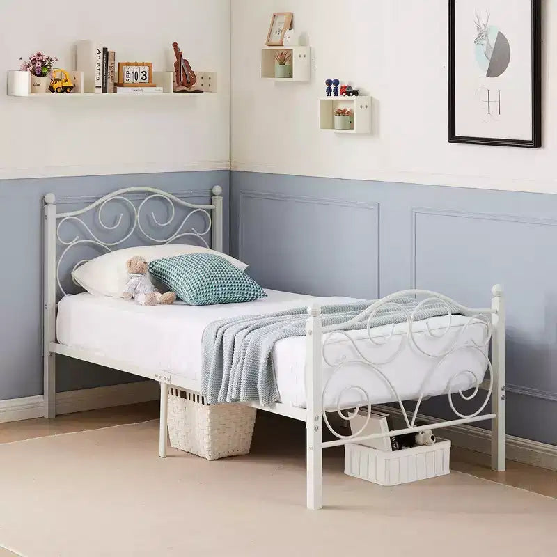 Struttura letto in metallo a volute con testiera e pediera