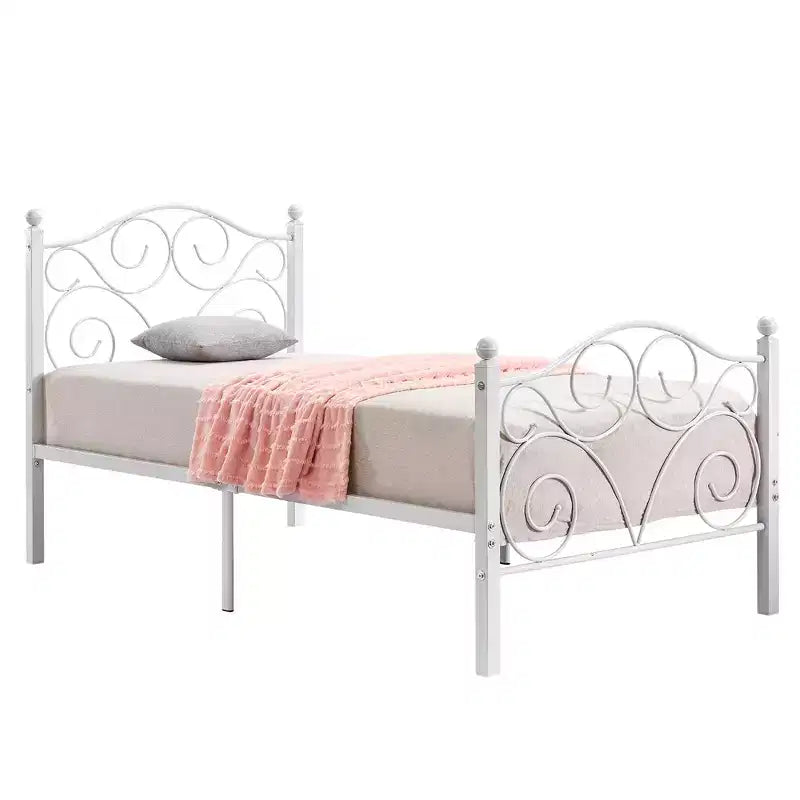 Struttura letto in metallo a volute con testiera e pediera