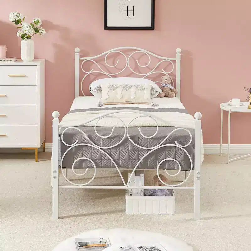 Struttura letto in metallo a volute con testiera e pediera