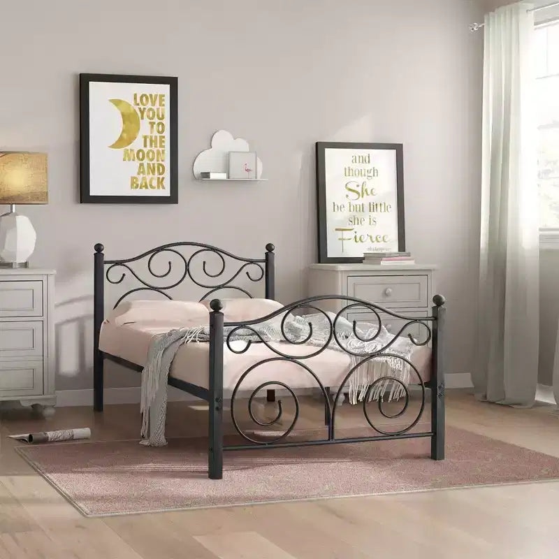 Struttura letto in metallo a volute con testiera e pediera
